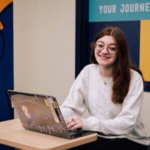 Tabitha Lawson, a sophomore transfer student, works inside the Commons.