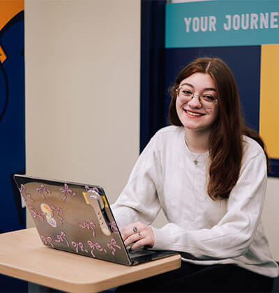 Tabitha Lawson, a sophomore transfer student, works inside the Commons.